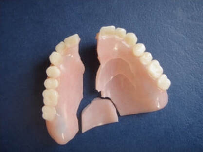 broken denture pieces